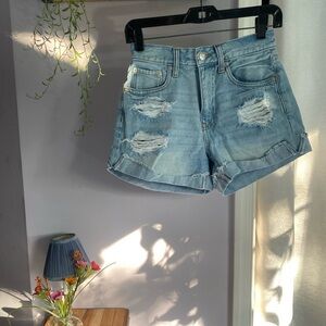 Blue denim mom shorts with a distressed look and raw hem from Aeropostale.